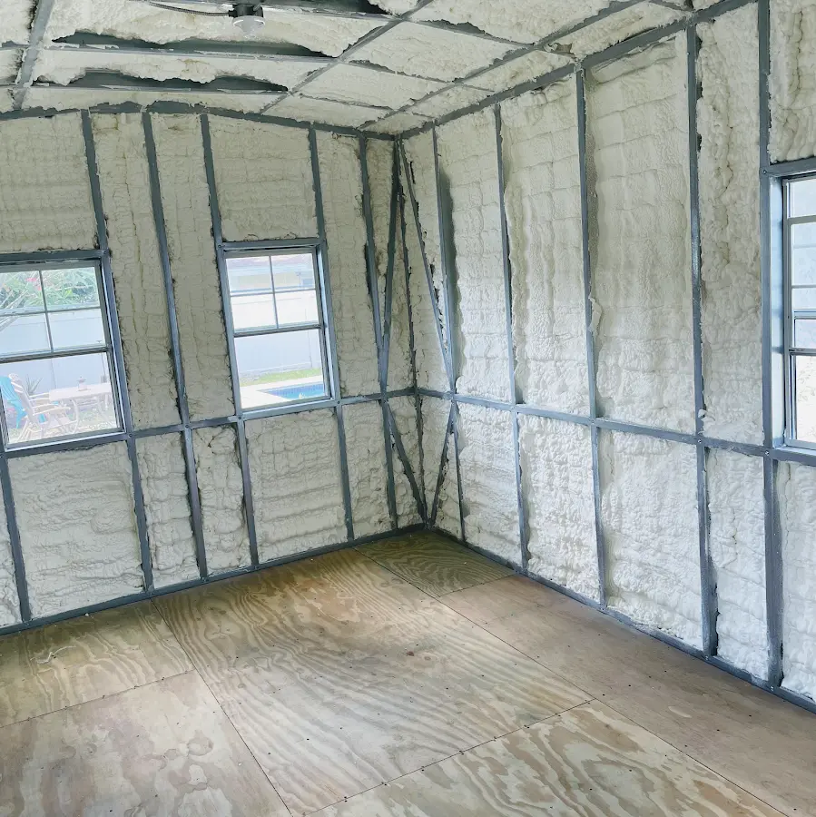 Closed-cell spray foam insulation applied to wall cavities in a residential project in Taylorsville